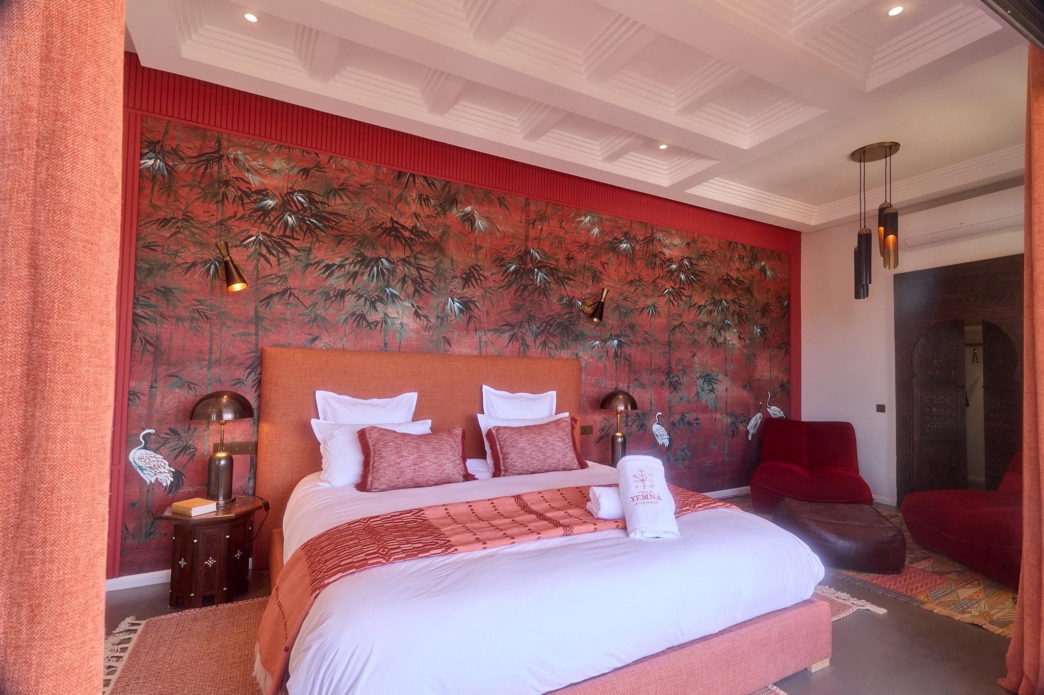 Villa Yemna suite with double bed and refined decor