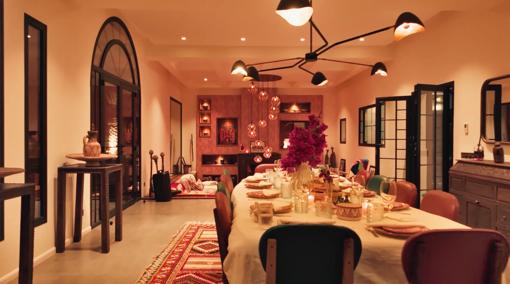 Riad dining room set for dinner in the evening at Villa Yemna.