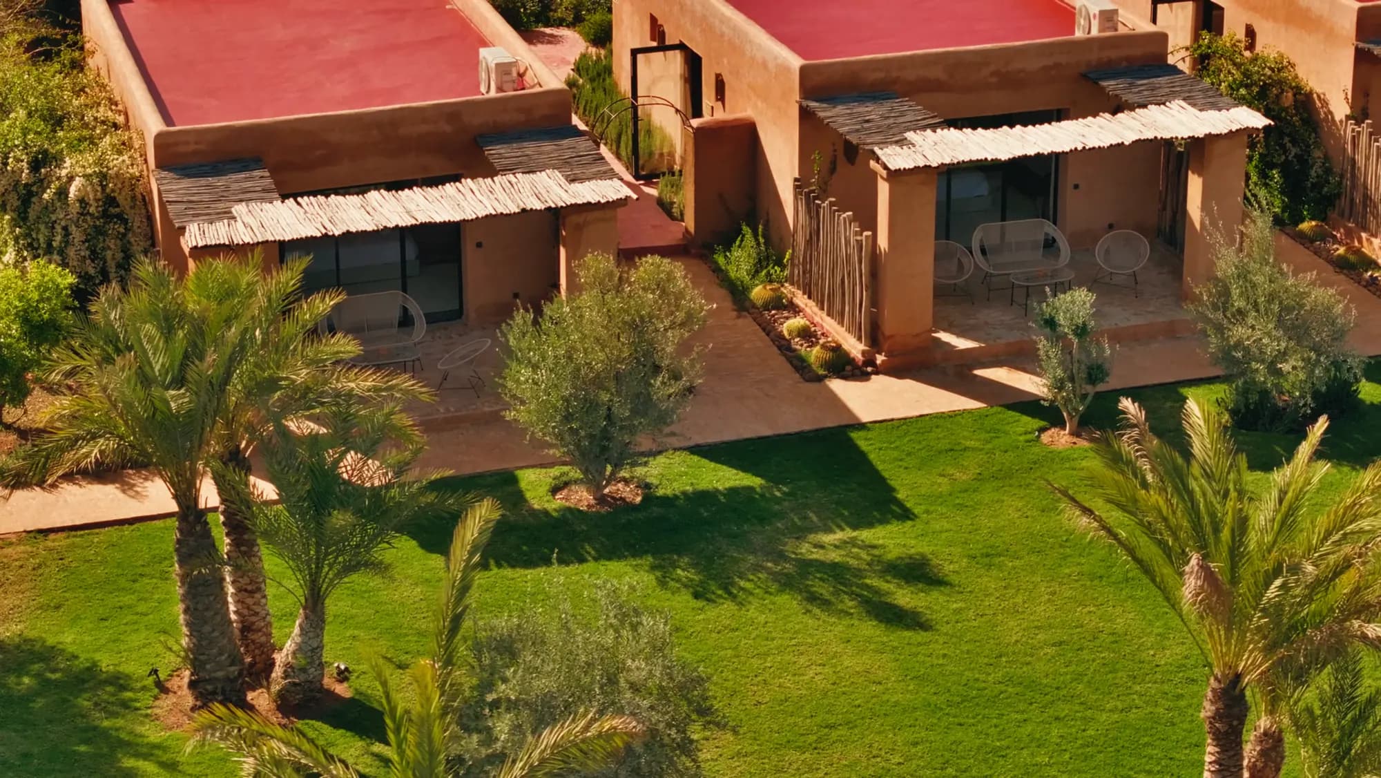 Drone view of the Villa Yemna suites with private terraces and gardens.